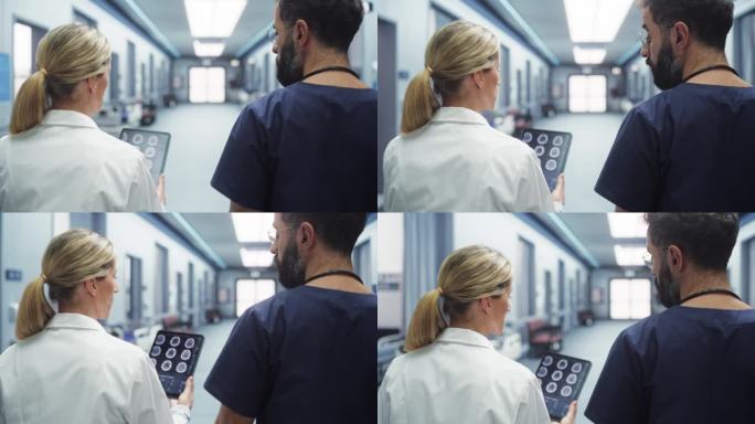 两名医生用平板电脑在医院走廊行走的后视跟踪镜头。外科医生和护士在医学肿瘤切除干预前检查脑MRI图像