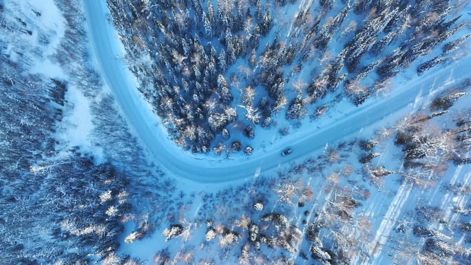 航拍冬季森林雪景道路