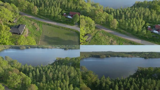 电影般的空中摄影小车倾斜显示度假屋和迷人的Illerasasjon湖，中午，瑞典