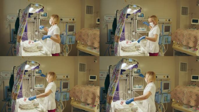 儿童健康，新生儿在医疗新生儿重症监护病房手术后躺在连接人工呼吸器的压力室中。