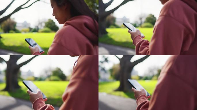在公园散步时用智能手机近距离拍摄