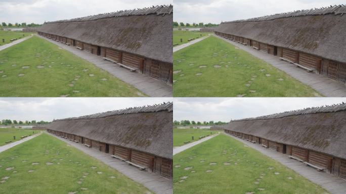 在比斯库平的考古遗址和波兰青铜时代晚期强化定居点的真人大小模型中。潘左射。