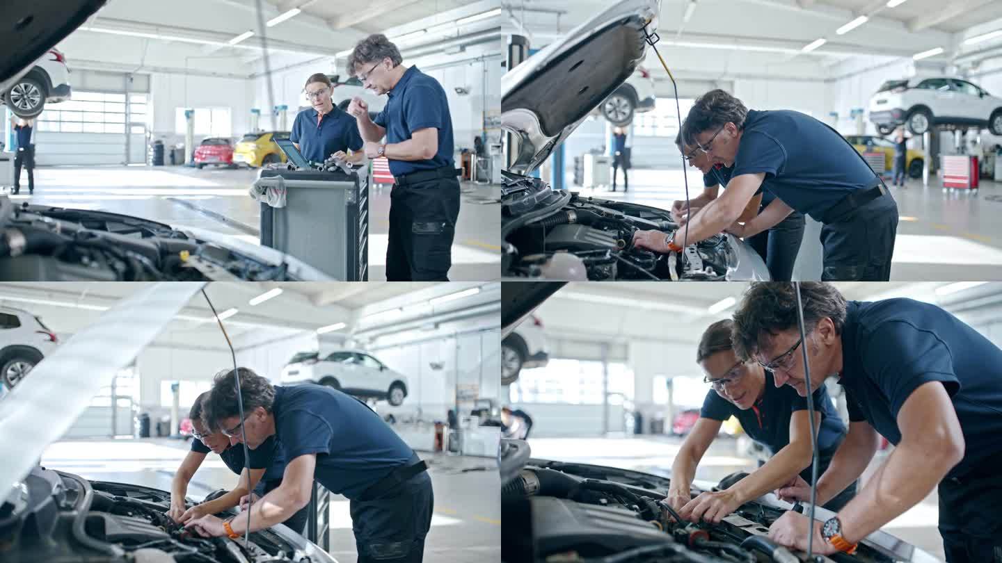 专业的汽车修理工男女一起在汽车修理店工作。