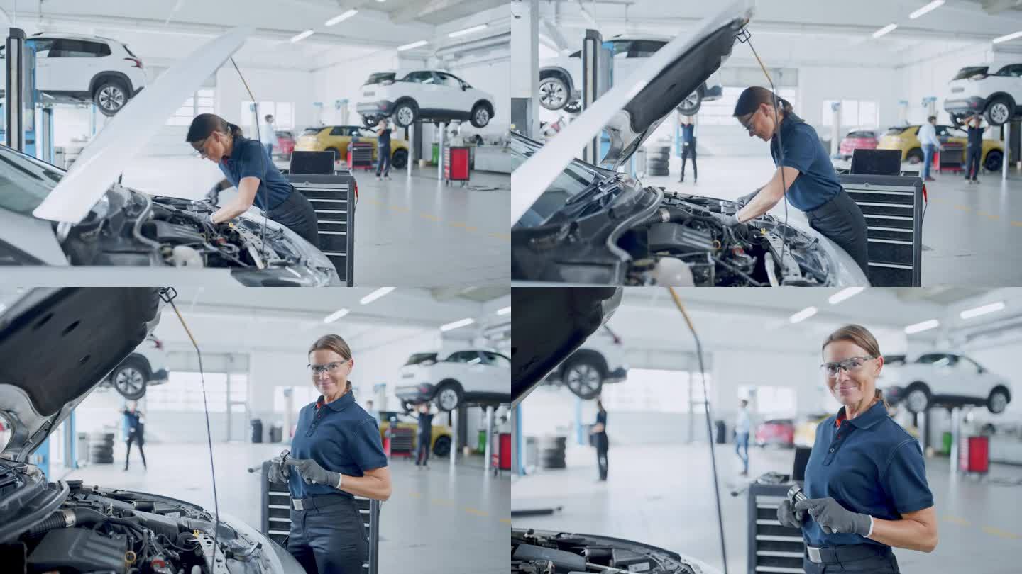 一位专业女性汽车修理工修车的美丽肖像。她在用棘轮。专家戴着安全眼镜。现代洁净车间