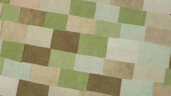 色彩丰富的复古纺织品背景与绿色色调的织物元素