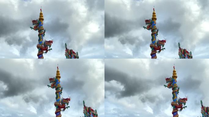 中国文化在中国寺庙的柱子上雕刻龙与风暴云