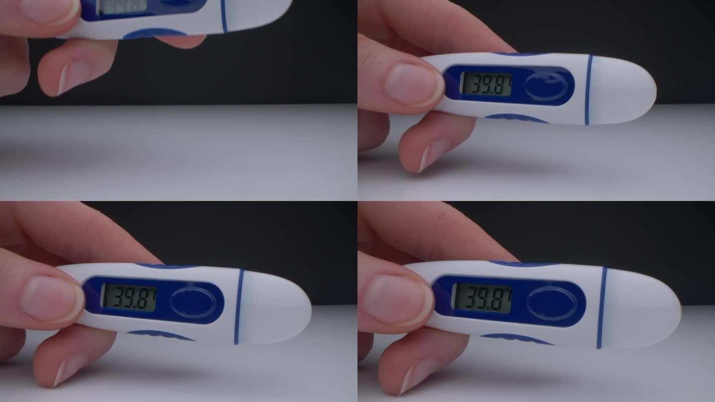 向摄像机视图移动到温度较高的温度计。疾病、体温、covid-19。探测器镜头。