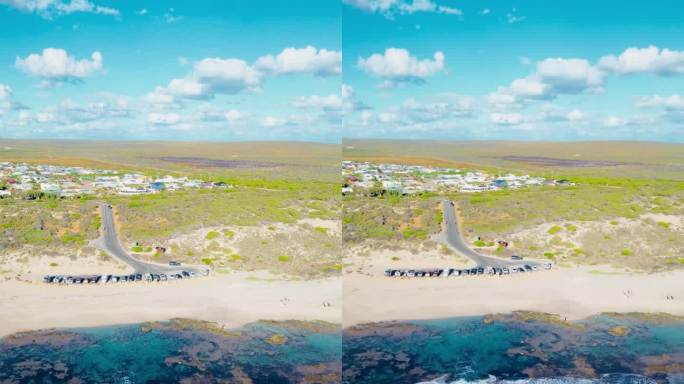 阳光明媚的一天，澳大利亚卡尔巴里蓝洞海滩上的印度洋海浪的无人机镜头