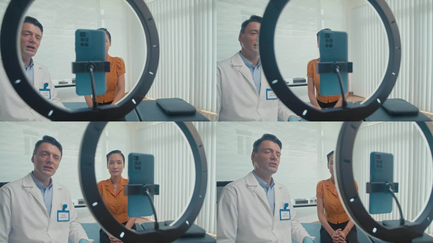 医生在与病人进行直播时对着智能手机上的摄像头说话