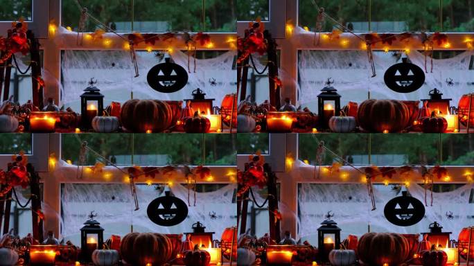 万圣节窗台上的节日装饰——南瓜、杰克灯笼、骷髅头、蜘蛛网、蜘蛛、骷髅、蜡烛和花环——一种舒适而可怕的