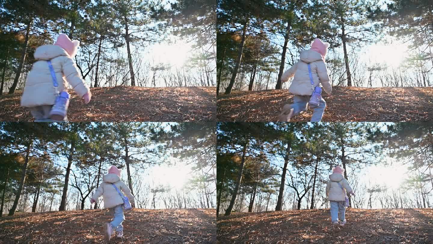 冬季树林儿童向阳光奔跑慢镜头