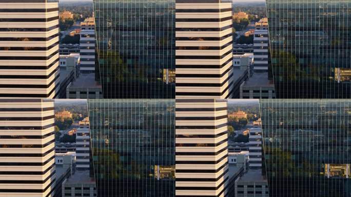 清晨，南卡罗来纳州哥伦比亚中心的玻璃摩天大楼拔地而起。航拍镜头与平移相机运动