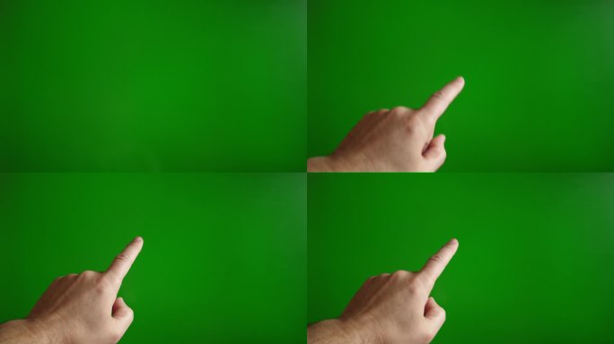 一个男人的手在绿色背景上按了一下(咔哒)。触摸屏概念。缓慢的运动。