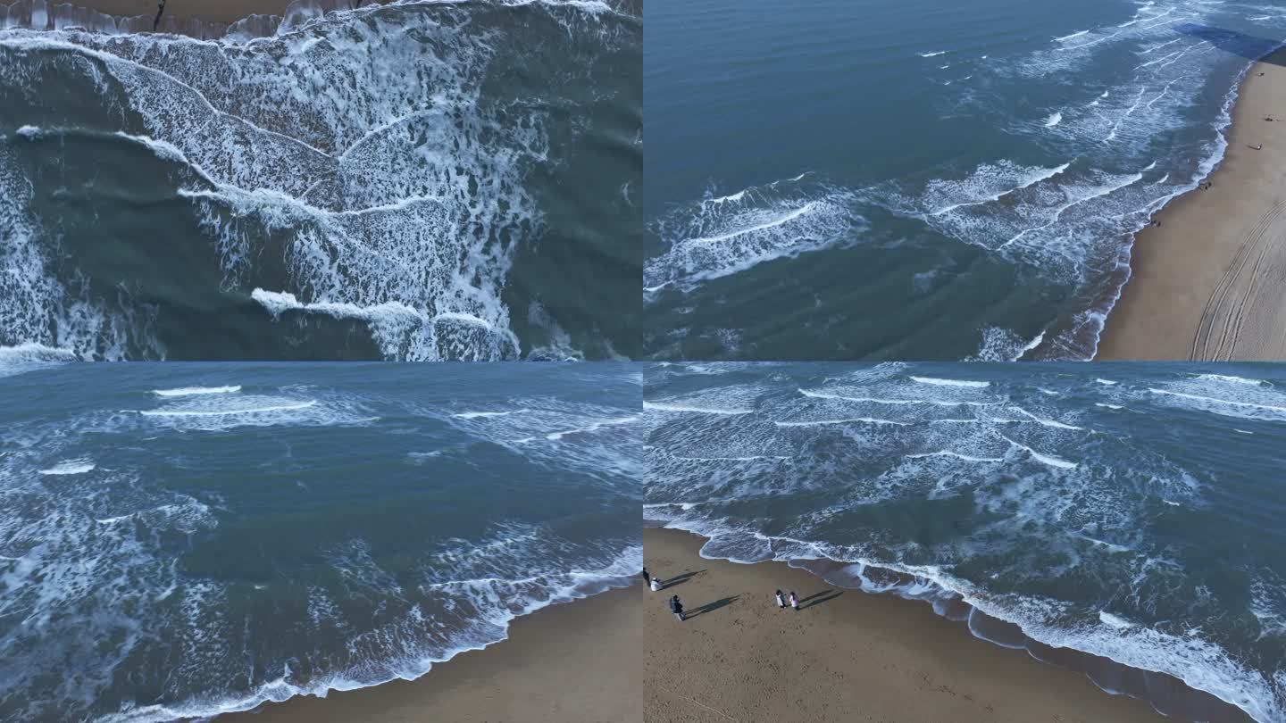 航拍温柔的海浪浪花拍打沙滩