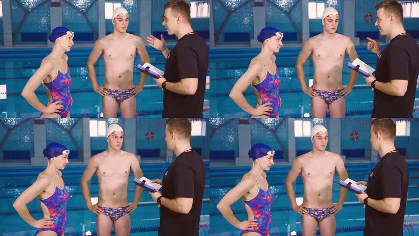 游泳池，教练激励和指导游泳运动员，并在锦标赛前解释训练计划。