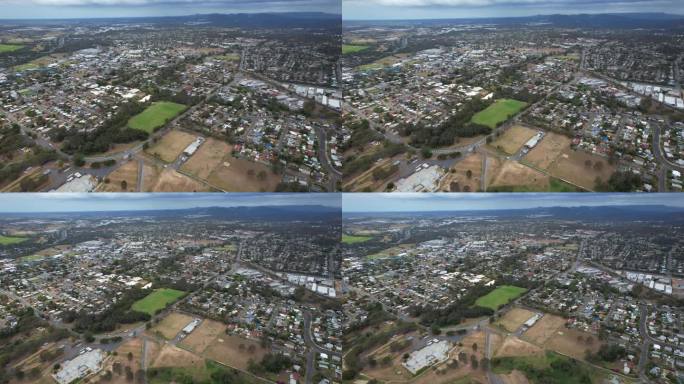 澳大利亚昆士兰州洛根市洛根霍姆郊区的住宅和运动场。空中回射