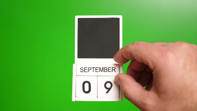 日历上的日期9月9日在绿色的背景。说明某一特定日期的事件。