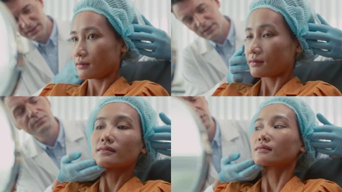 亚洲女性患者在返老还童手术后照镜子