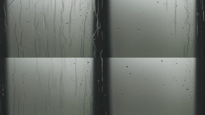 淋浴间玻璃门处的玻璃表面景观，水流顺流而下。