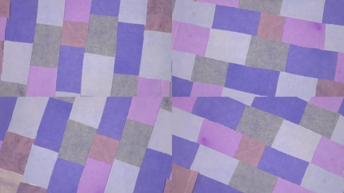 色彩丰富的复古纺织品背景与紫色色调的织物元素