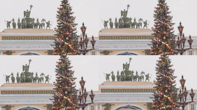 主圣诞树上闪烁着彩灯的装饰，城市的中央宫殿广场在降雪期间装饰的庆祝活动，总参谋部拱门，武装部队的旗帜