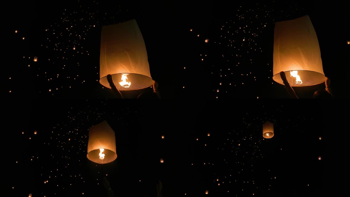 泰国清迈，游客在灯节上漂浮着天灯。