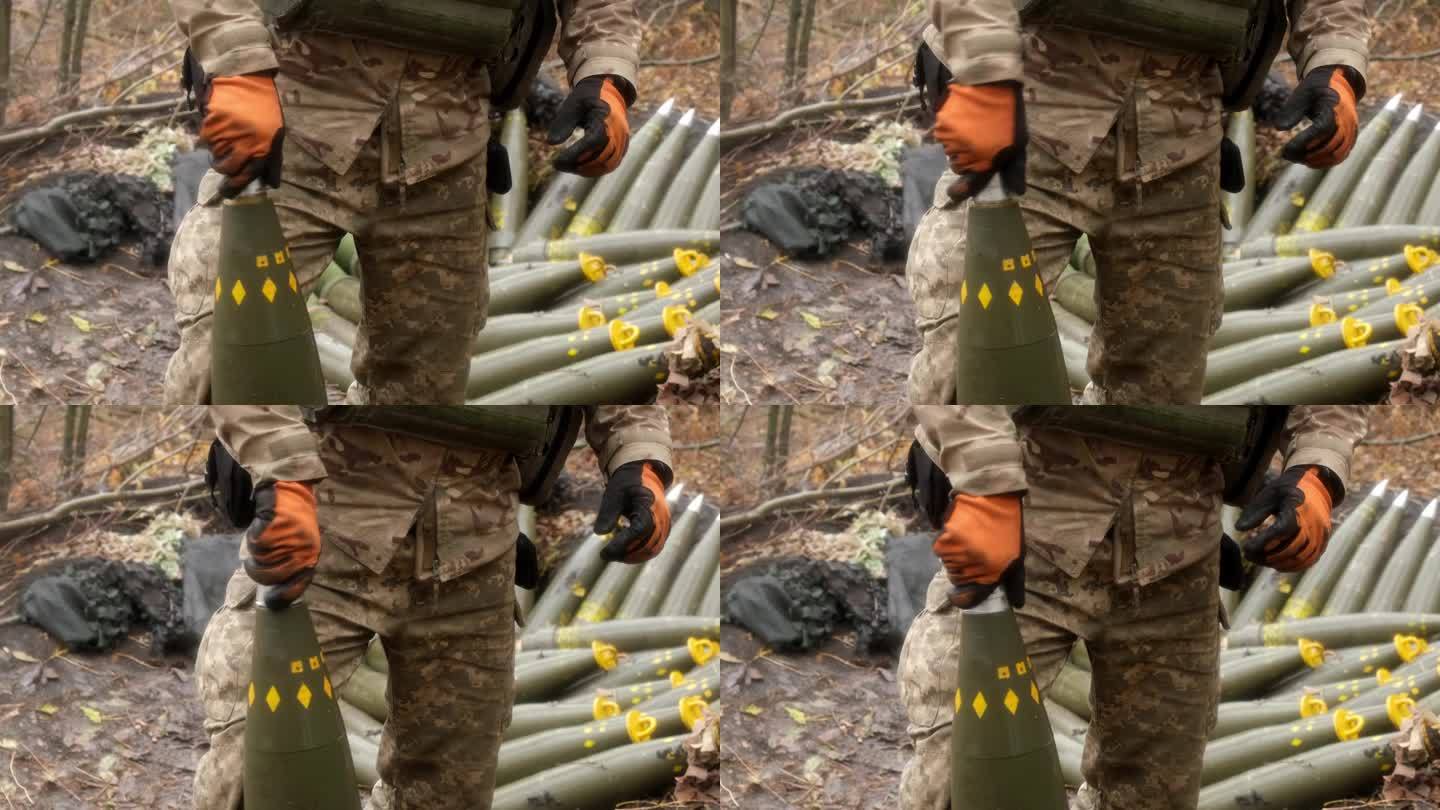 一名男性军事操作员准备在茂密的森林中发射炮弹。军事防御和军事装备的概念。