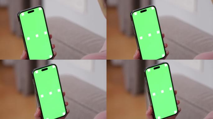 在沙发上居家环境使用手机绿幕手机内容替换