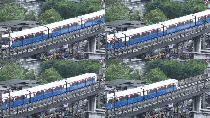 泰国曼谷——2021年6月8日:曼谷On Nut BTS站下起了暴雨。雨中火车在城市。恶劣的天气条件