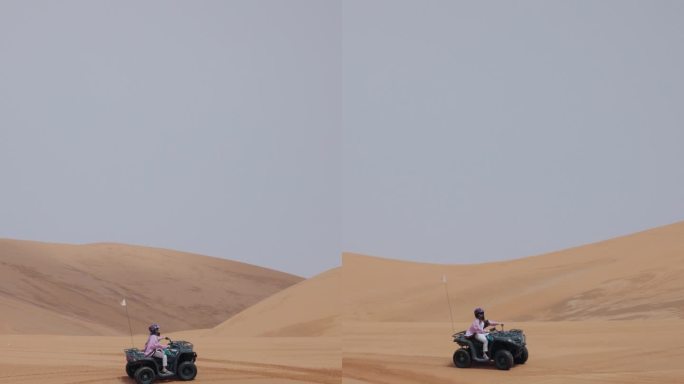 一位年轻的亚洲女游客正骑着四轮摩托穿越摩洛哥的撒哈拉沙漠。