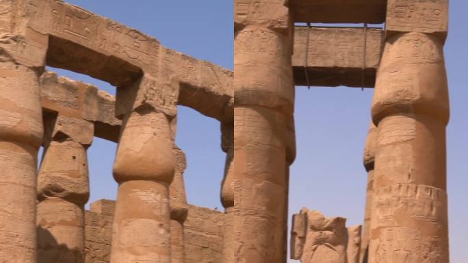 卢克索神庙内的法老雕像和埃及圆柱上的图画