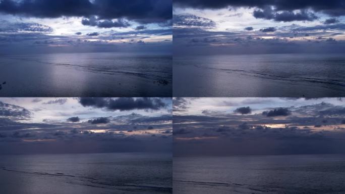 航拍，光照射蔚蓝平静大海唯美的夕阳