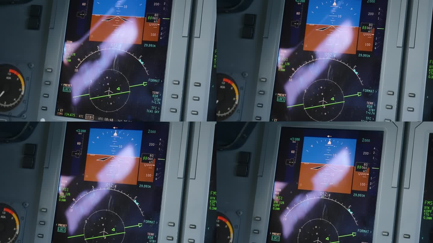 豪客750豪华喷气式飞机内飞行员的首次飞行显示的爆炸镜头。PFD取代人工地平线，同时显示校准的空速、