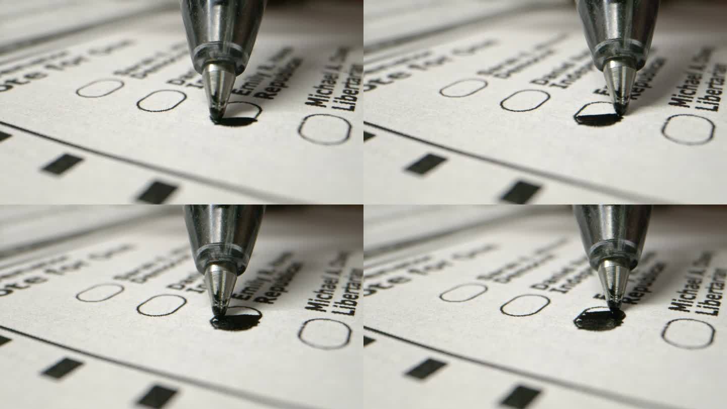 在总统、参议院、国会或地方选举中，一支圆珠笔在家里填写邮寄选票的特写微距视频