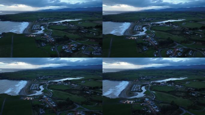 夜间无人机接近电影邦马洪村铜海岸沃特福德爱尔兰在一个冬天的晚上与新的海岸警卫队站