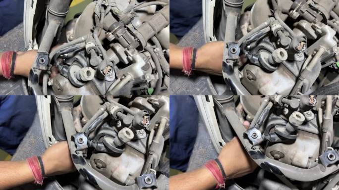 机修工修理摩托车的特写。