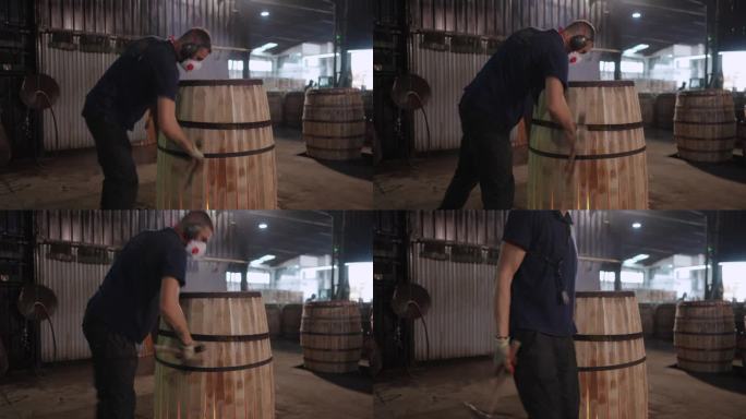 视频4k Prores HQ。在赫雷斯(雪利酒)的一个合作社里，工人师傅制作了一个装白兰地的木桶，橡