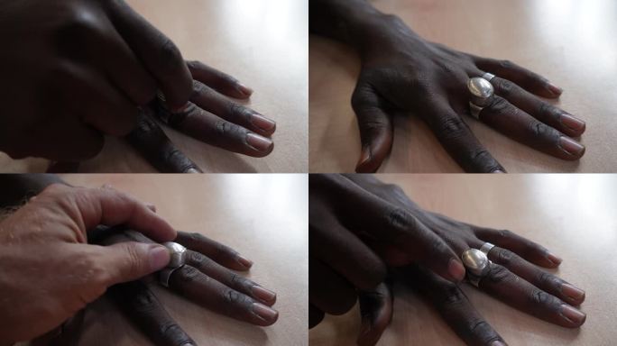 黑人的手。
