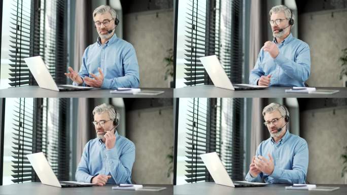 成熟的白发胡须商人，戴着耳机坐在办公室的工作场所进行视频通话