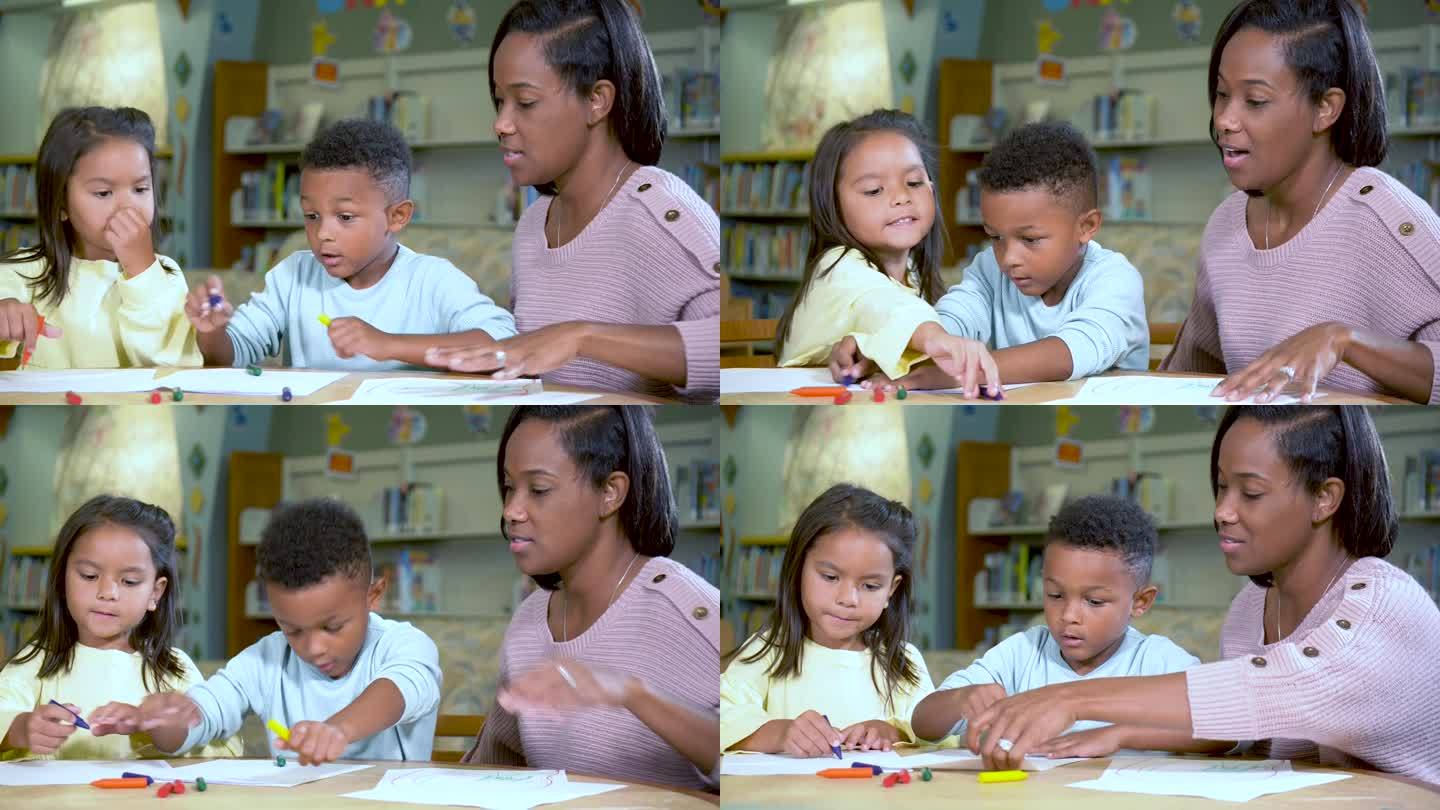 女人，多种族的孩子用蜡笔画画