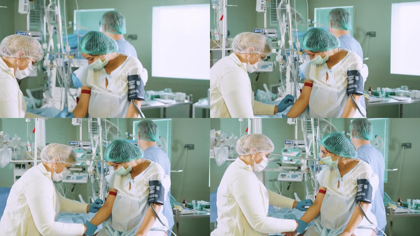 医生将一根针插入病人的脊柱进行麻醉。缓解手术前的疼痛。脊髓麻醉注射、硬膜外麻醉或神经阻滞。麻醉师在工