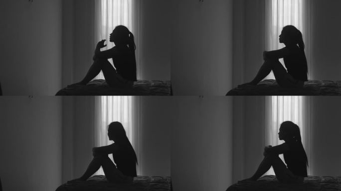 一个妇女的轮廓与抑郁和抑郁，悲伤，焦虑，家庭问题，精神病患者，家庭暴力的症状