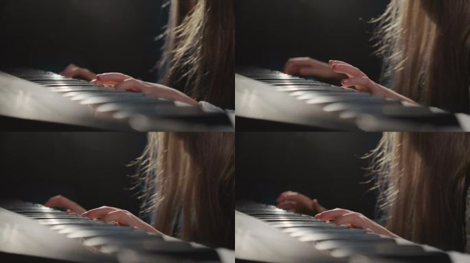 钢琴的琴键能感觉到女孩手指的触摸