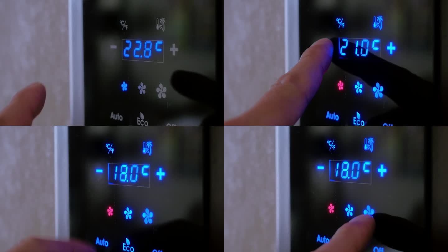 视频4 k。曼斯用手指在房间墙壁上的电子面板上设定空调的温度。现代室内气候控制系统