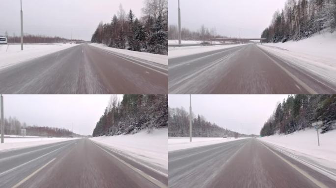 面对冬季高速公路上的困难，这辆车在雪地上行驶自如。