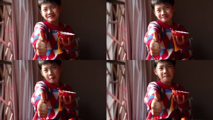 中国家庭小孩吃饺子慢镜头