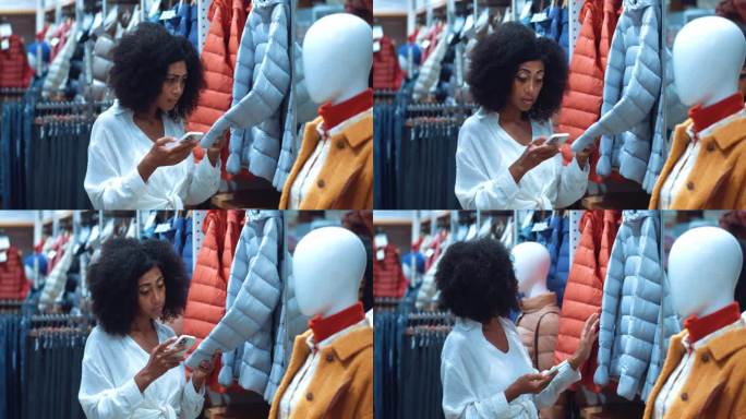 一名非裔美国女性购物狂，在网上用手机查看服装店货架上新衣服的纸巾质量