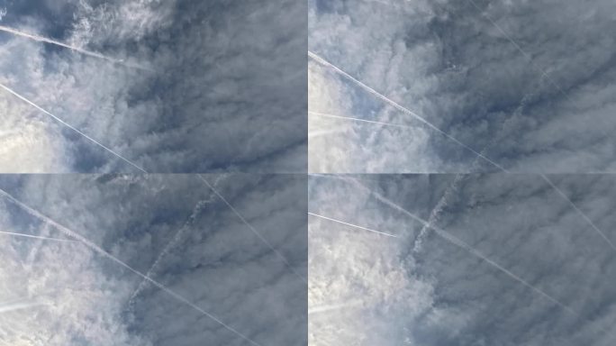 飞机尾迹，或称同构云，是飞机释放的人造云。水蒸气使天空变暗