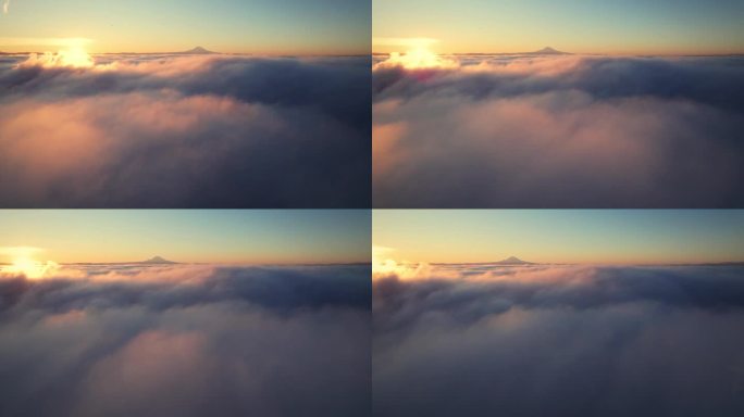 日出时雷尼尔山的梦幻云中航拍