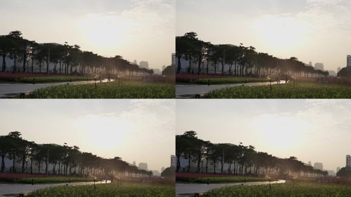 4K实拍广州珠江新城海心沙日落与洒水浇花